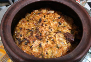 Speisen - Schweinenacken mit Weißkohl